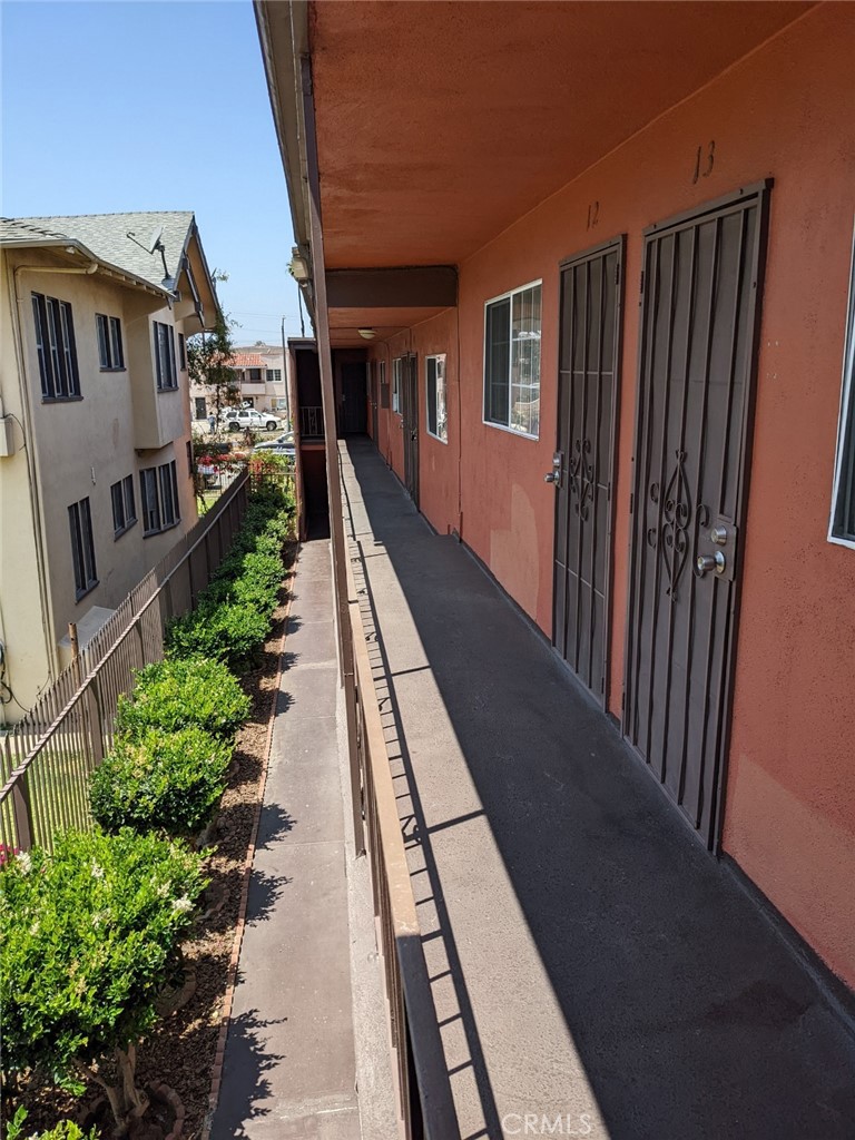 1708 Pine Avenue, Unit 11 Long Beach, CA 90813 - Photo 16 of 17 a view of a backyard with patio