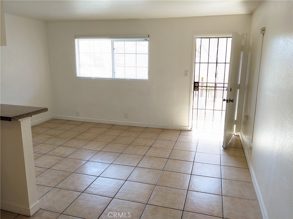 1708 Pine Avenue, Unit 11 Long Beach, CA 90813 - Photo 3 of 17 a view of an empty room and window