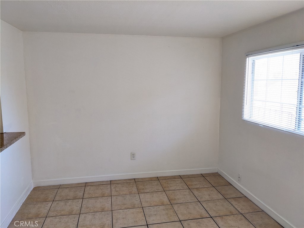 1708 Pine Avenue, Unit 11 Long Beach, CA 90813 - Photo 4 of 17 a view of an empty room and window