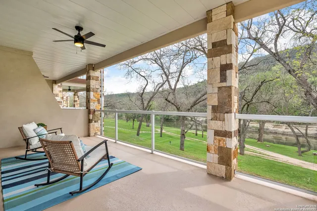 a view of a patio with a backyard