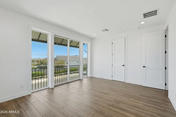 a view of an empty walk in closet
