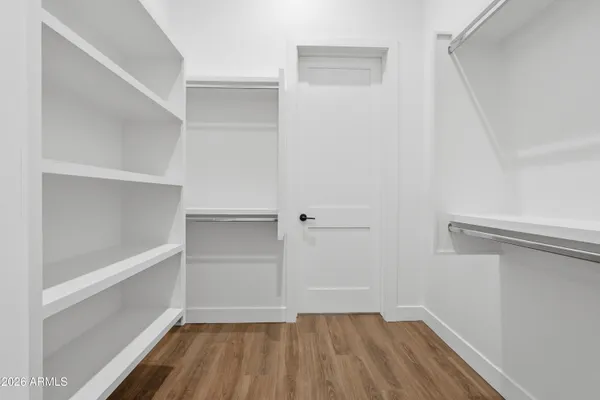 a view of an empty walk in closet