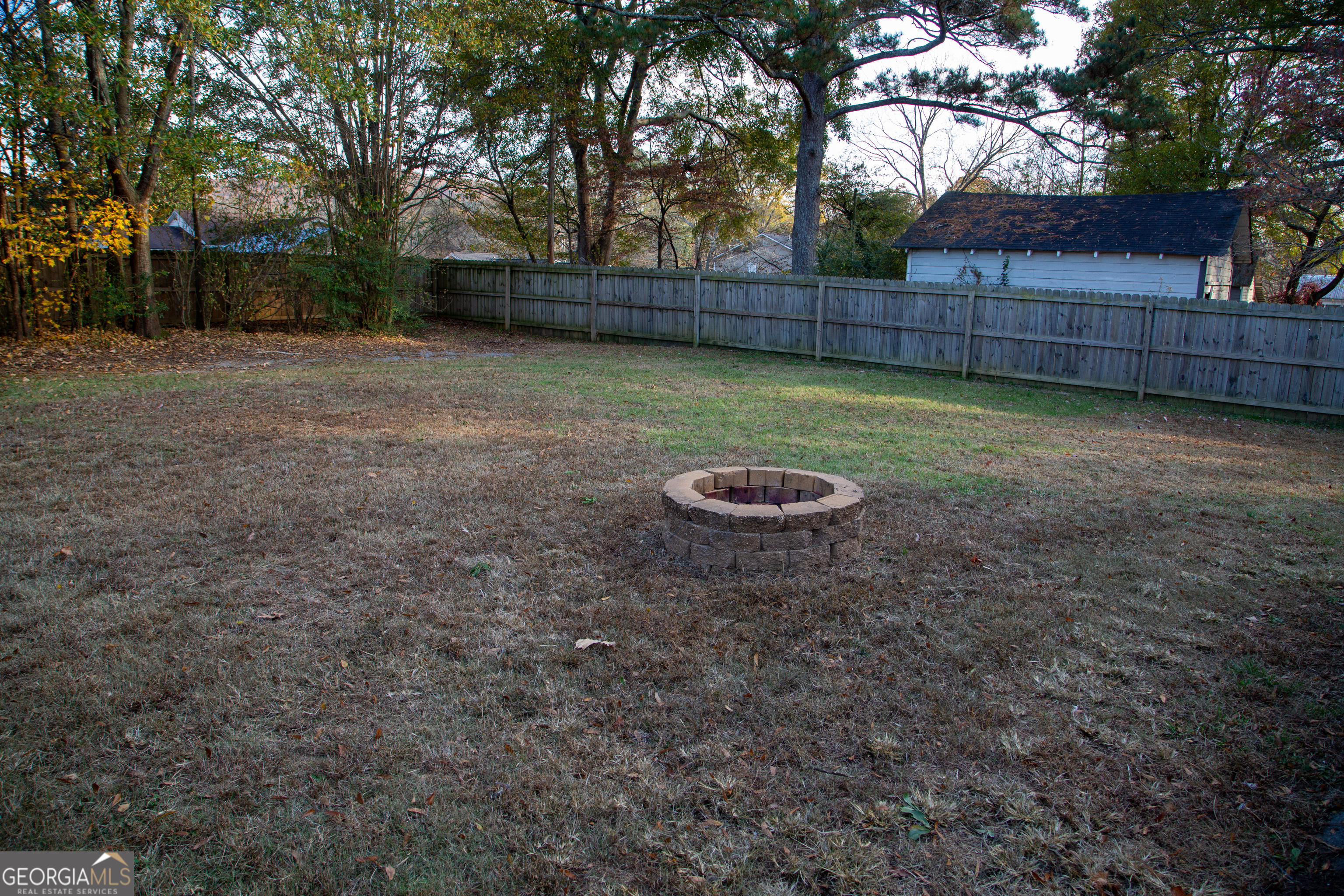 307 South Duke Street LaFayette, GA 30728 - Photo 5 of 23 a view of a backyard of the house