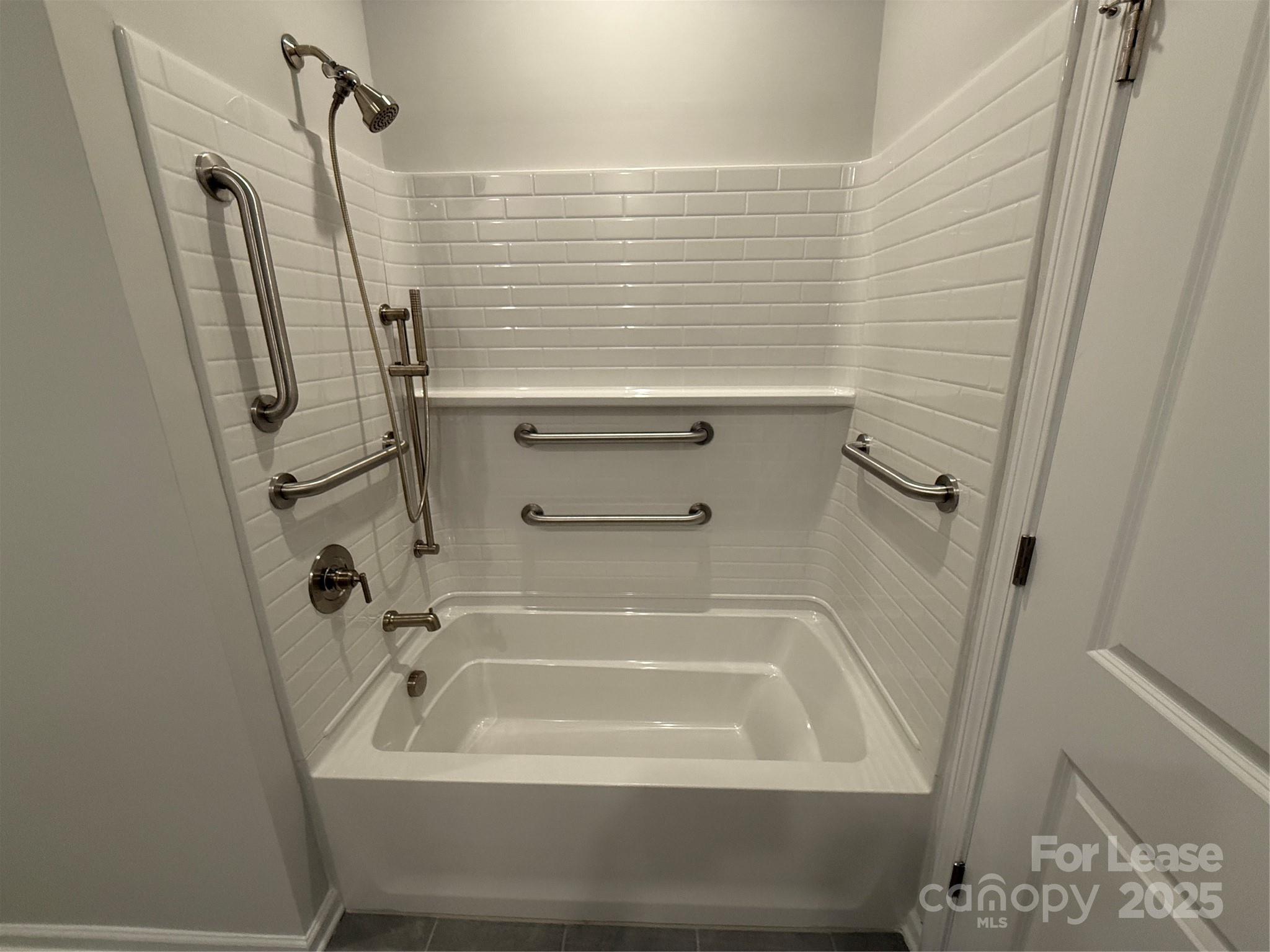 4455 Reed Crk Drive, Unit 101 Sherrills Ford, NC 28673 - Photo 15 of 34 a bathroom with a bathtub
