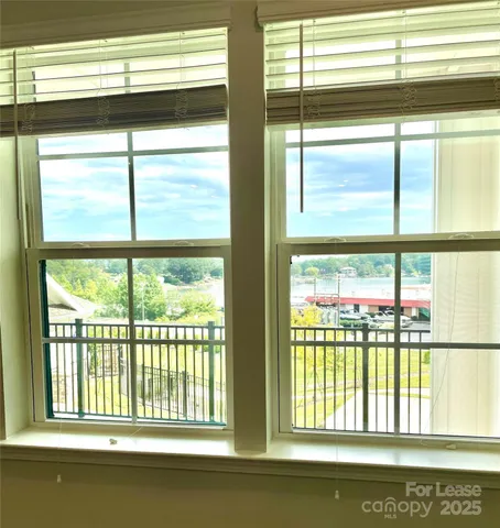 a view of a large window with an outdoor space