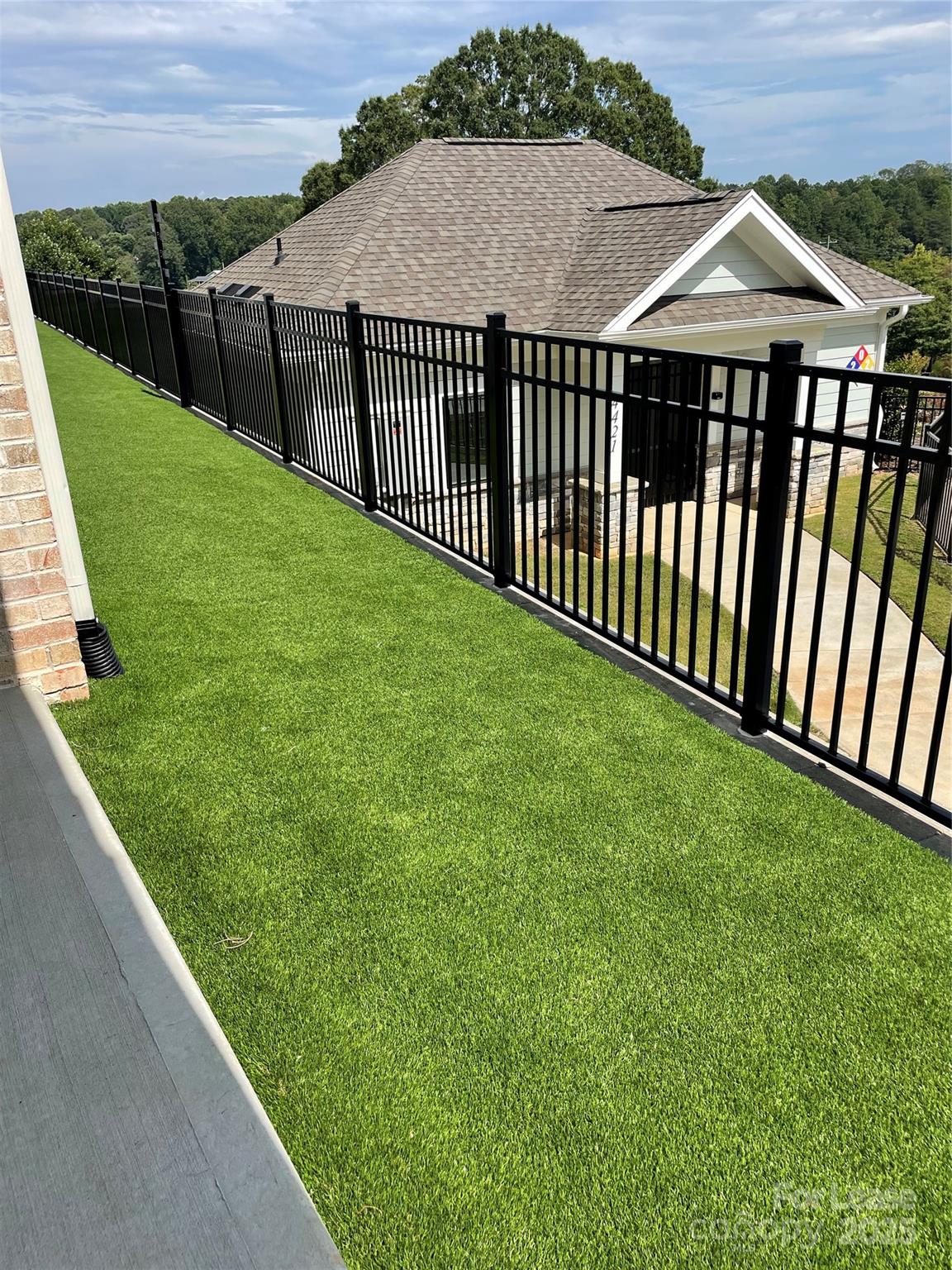4455 Reed Crk Drive, Unit 101 Sherrills Ford, NC 28673 - Photo 26 of 34 a view of a backyard with a garden