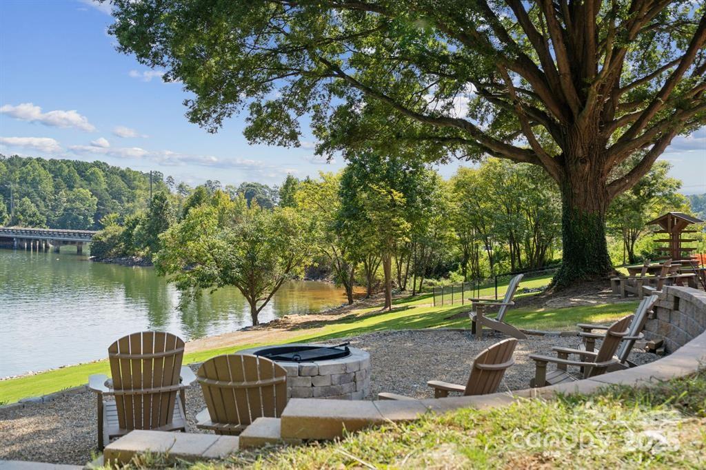 4455 Reed Crk Drive, Unit 101 Sherrills Ford, NC 28673 - Photo 28 of 34 a view of a park with large tree