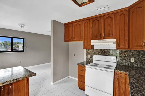 a view of kitchen with washer and dryer
