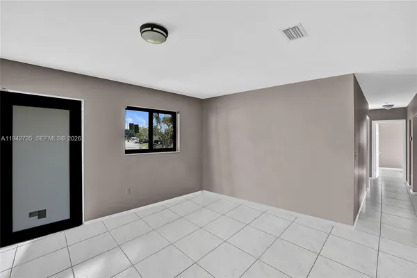 a view of a livingroom with wooden floor