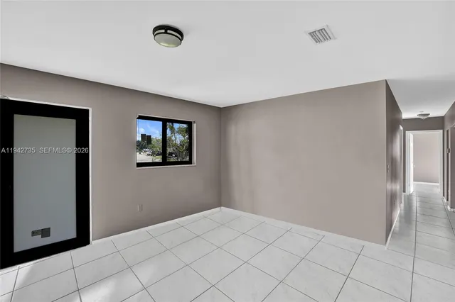 a view of a livingroom with wooden floor