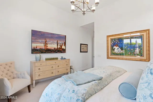 a bedroom with a bed and furniture