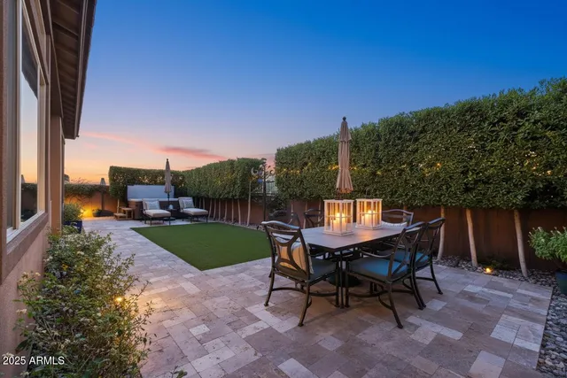 a view of a sitting space in the backyard