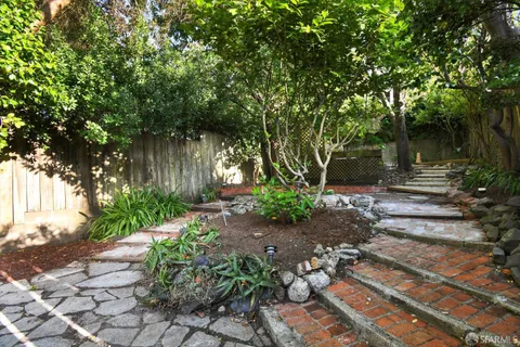 a backyard of a house with lots of green space