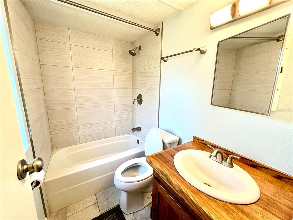 4008 77th Boulevard Jasper, FL 32052 - Photo 13 of 35 a bathroom with a sink and a mirror