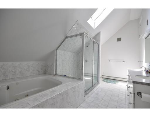 33 Chestnut Street Wellesley, MA 02481 - Photo 13 of 17 a bathroom with a bathtub and a shower