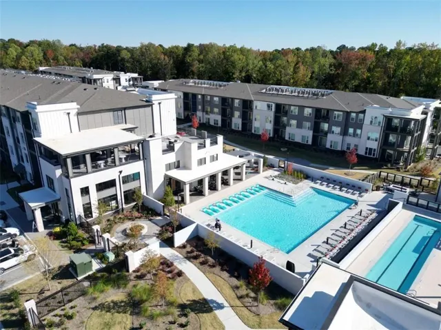 an aerial view of a house with a garden