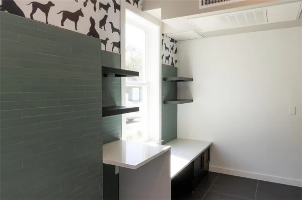 a view of swimming pool with outdoor seating and city view