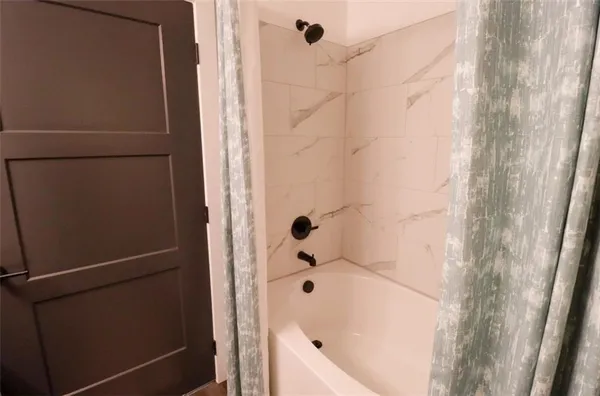 a bathroom with a bathtub