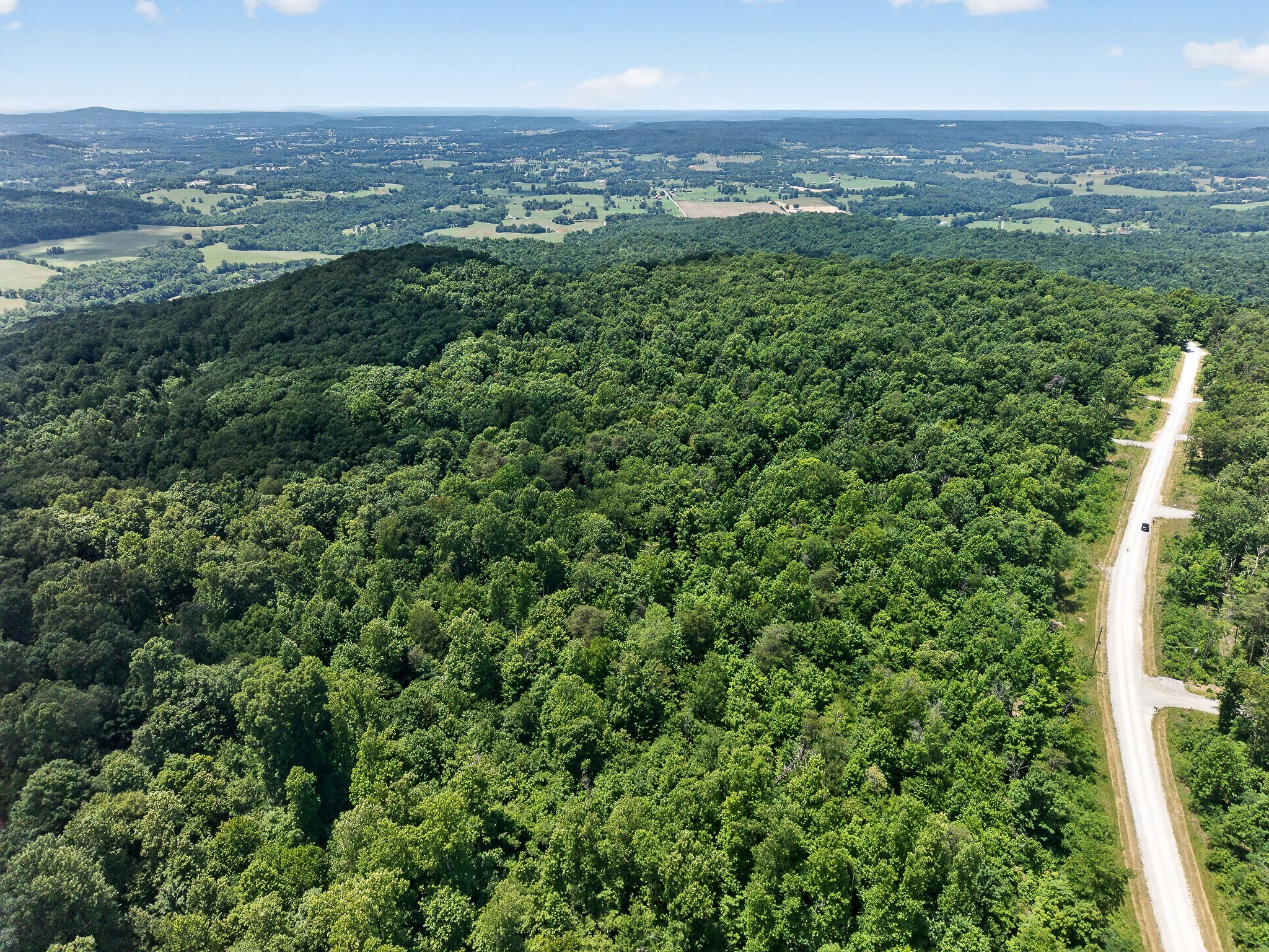 0 Coal Bank Road Sparta, TN 38583 - Photo 4 of 15 an aerial view of residential houses with outdoor space and trees