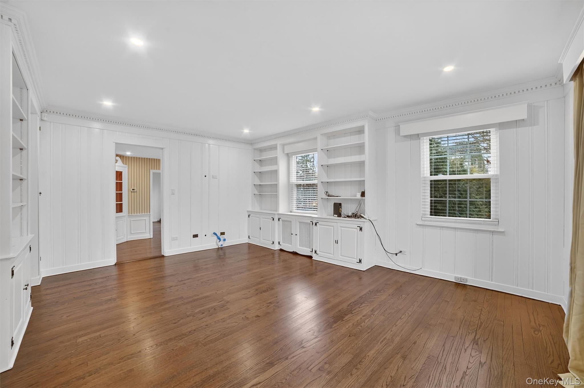 30 Argyle Road Rye Brook, NY 10573 - Photo 14 of 48 an empty room with wooden floor and windows