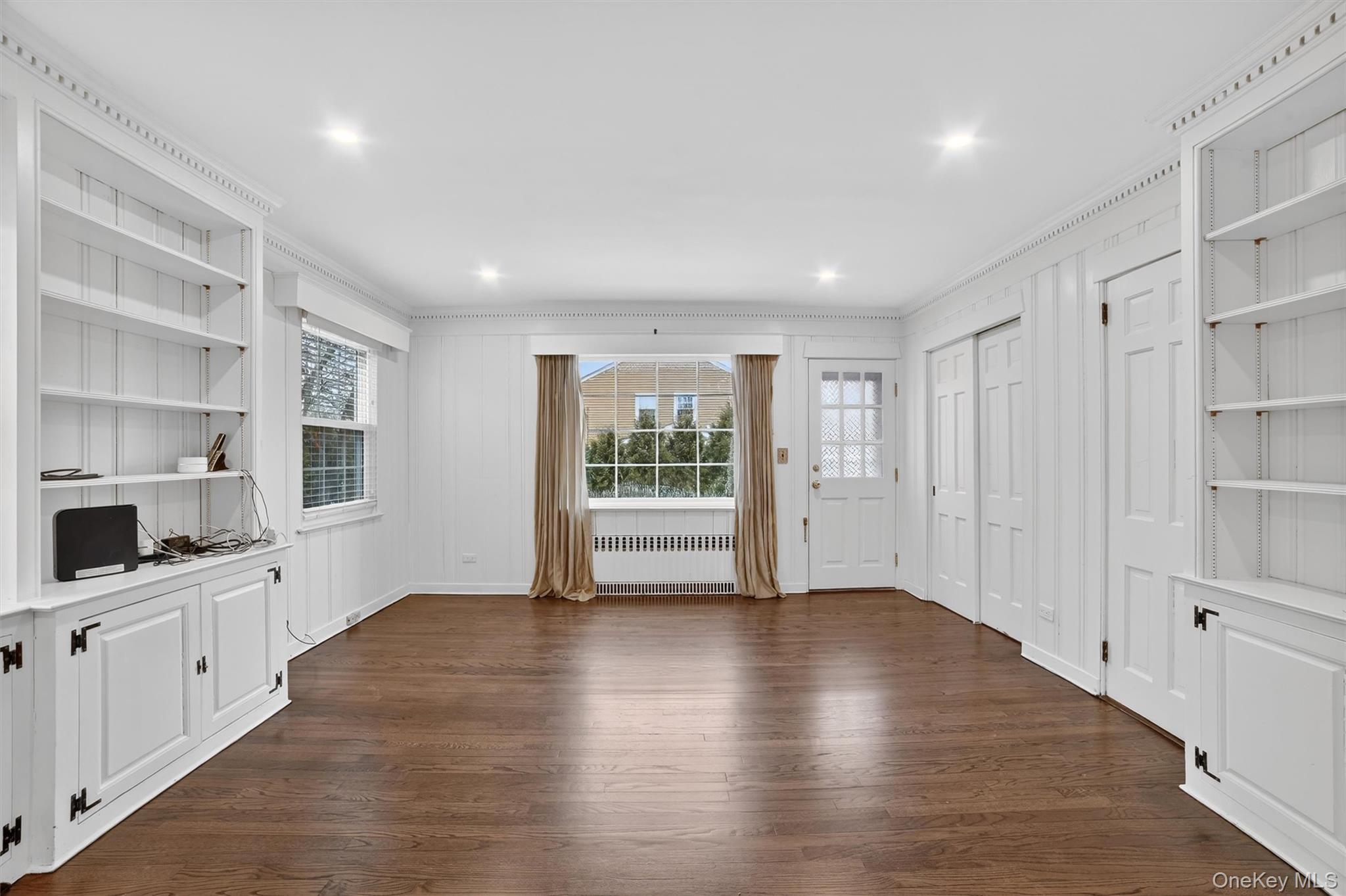 30 Argyle Road Rye Brook, NY 10573 - Photo 15 of 48 a view of an empty room with wooden floor and a window