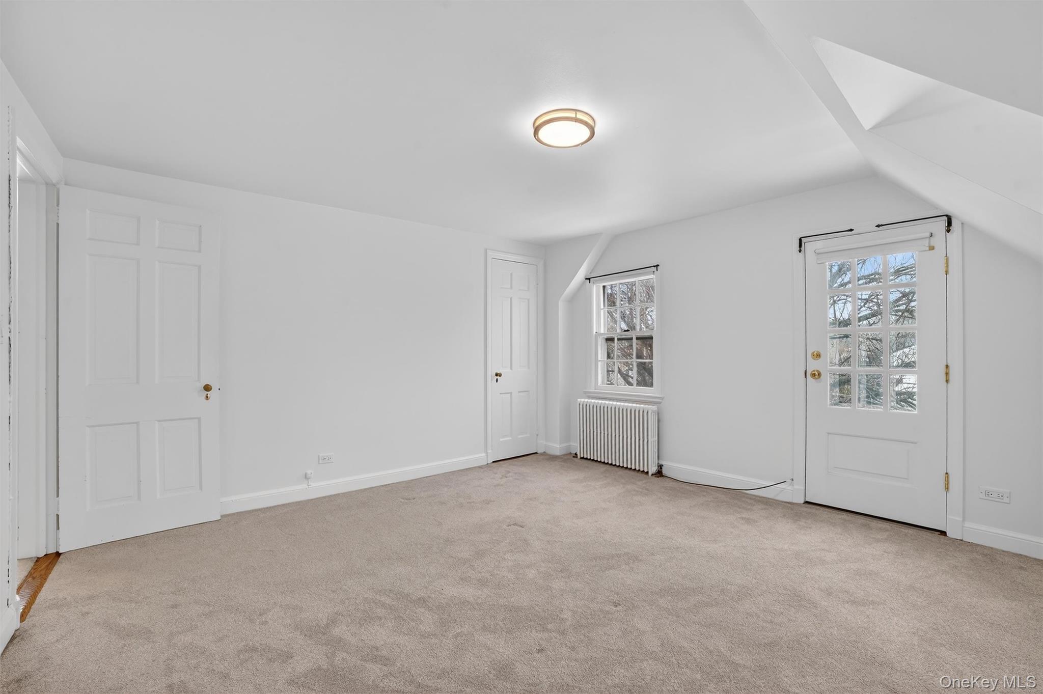 30 Argyle Road Rye Brook, NY 10573 - Photo 19 of 48 an empty room with windows