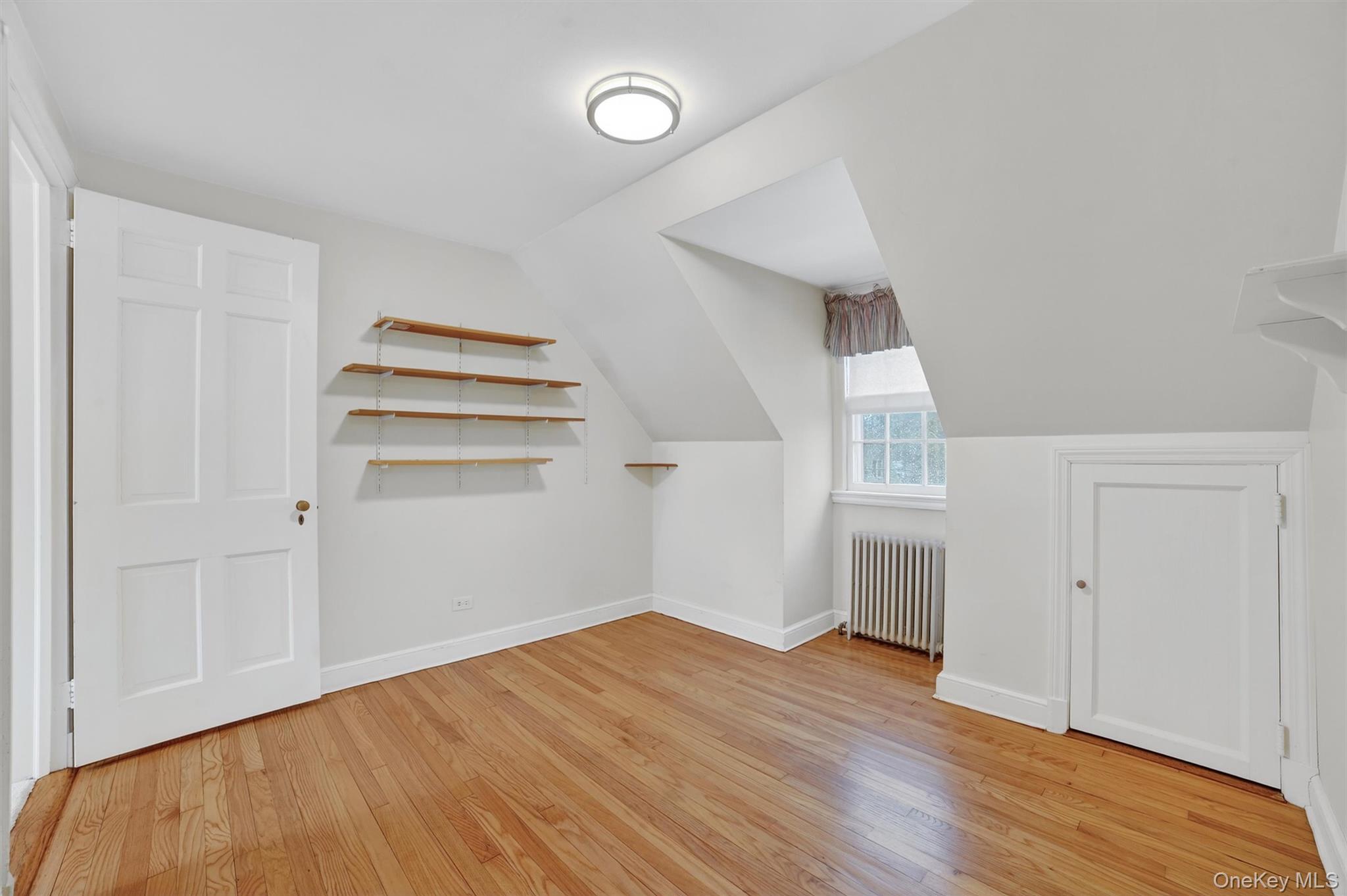 30 Argyle Road Rye Brook, NY 10573 - Photo 21 of 48 a view of empty room with wooden floor and window