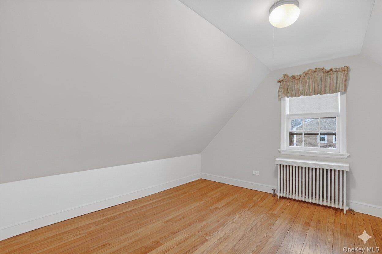 30 Argyle Road Rye Brook, NY 10573 - Photo 22 of 48 an empty room with wooden floor and windows