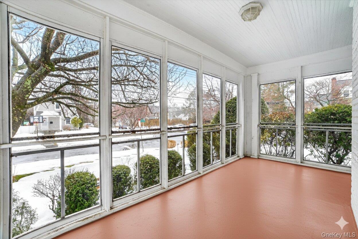 30 Argyle Road Rye Brook, NY 10573 - Photo 27 of 48 a view of an empty room with wooden floor and a large window