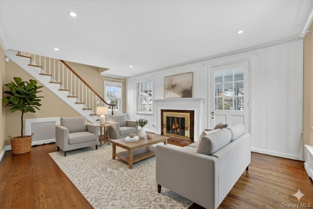 30 Argyle Road Rye Brook, NY 10573 - Photo 4 of 48 a living room with furniture and a fireplace