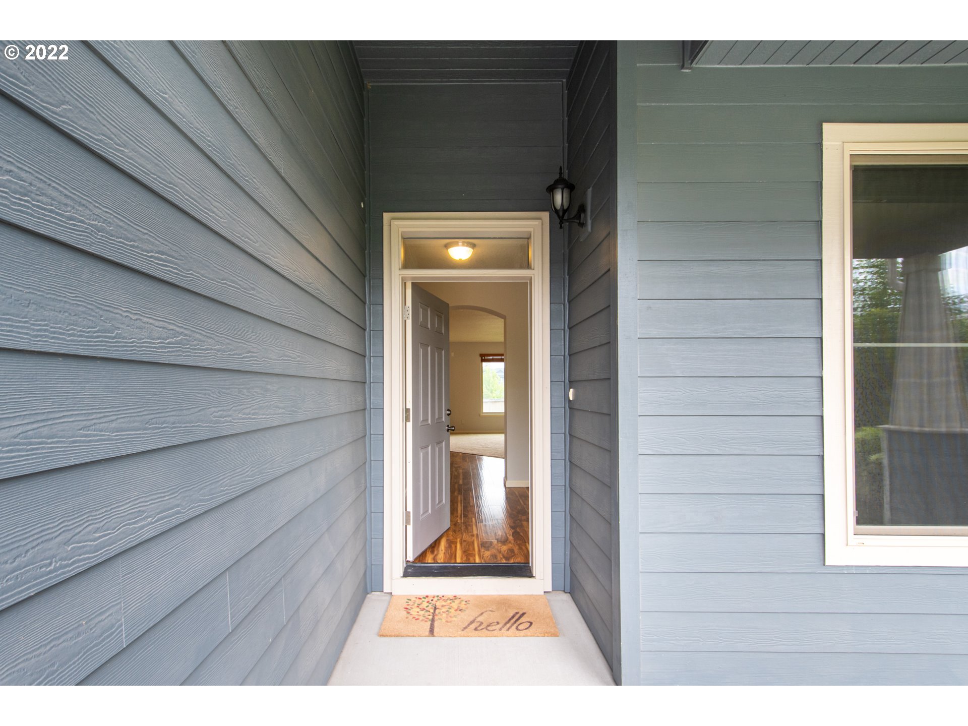 2312 South Wind River Way Ridgefield, WA 98642 - Photo 2 of 30 a view of a door and wooden floor