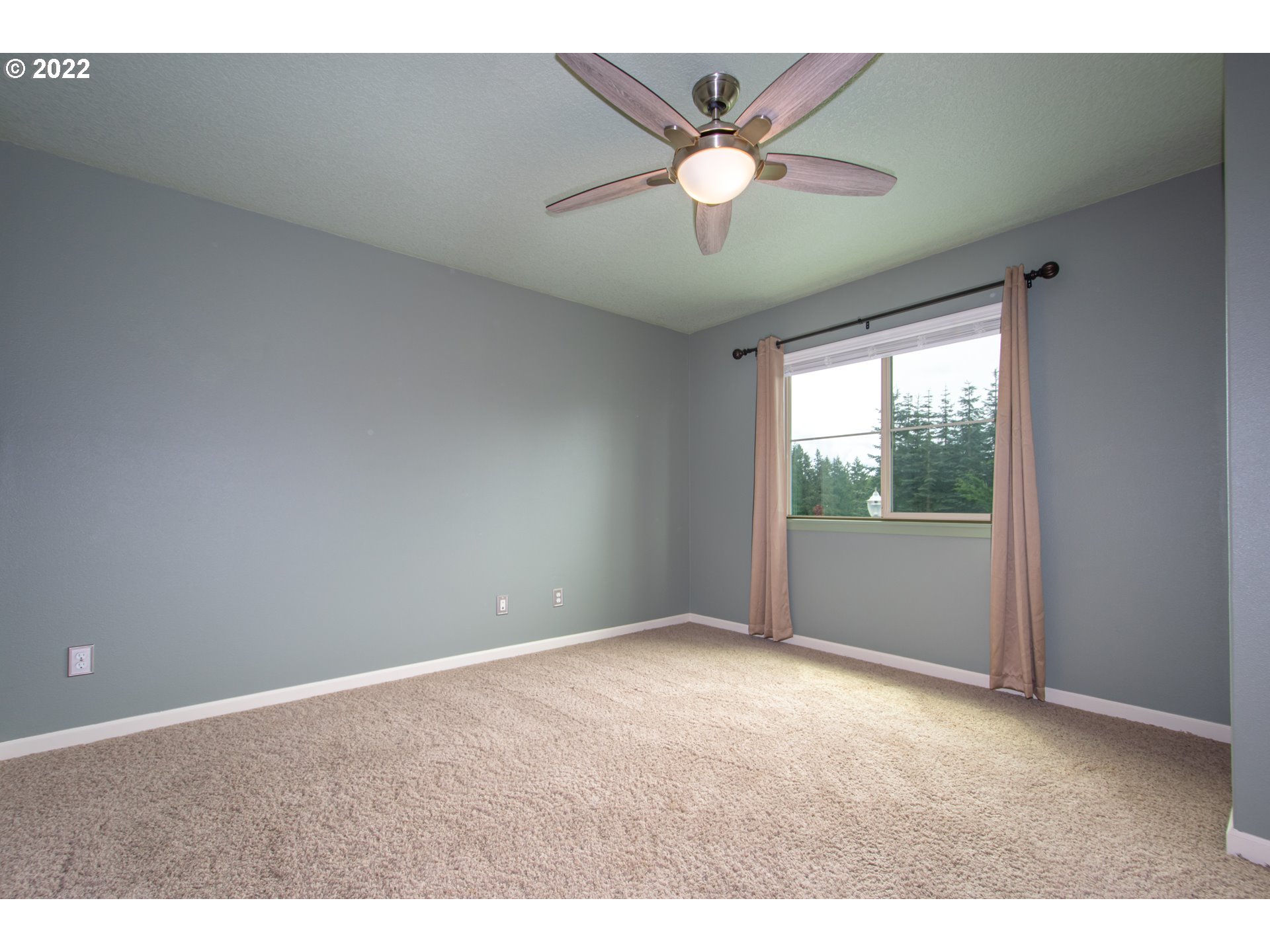 2312 South Wind River Way Ridgefield, WA 98642 - Photo 23 of 30 a view of an empty room with a window