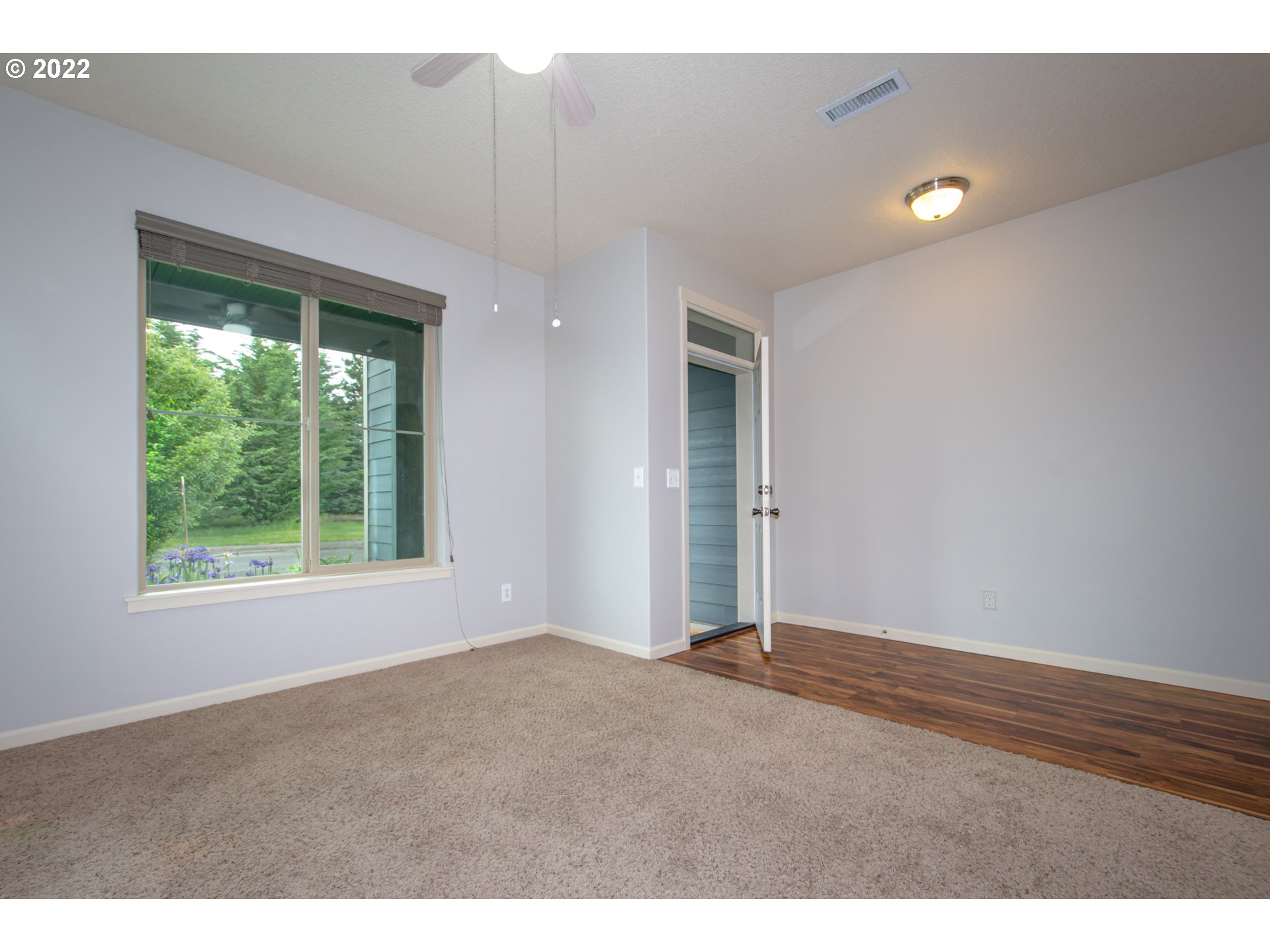 2312 South Wind River Way Ridgefield, WA 98642 - Photo 4 of 30 a view of an empty room with a window