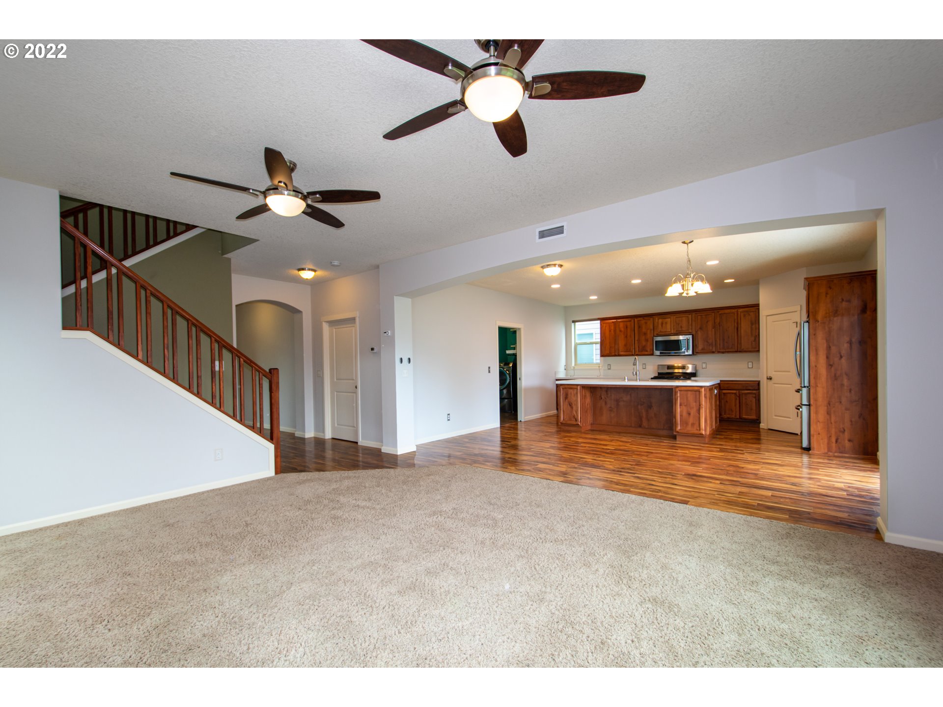 2312 South Wind River Way Ridgefield, WA 98642 - Photo 8 of 30 a view of empty room with wooden floor