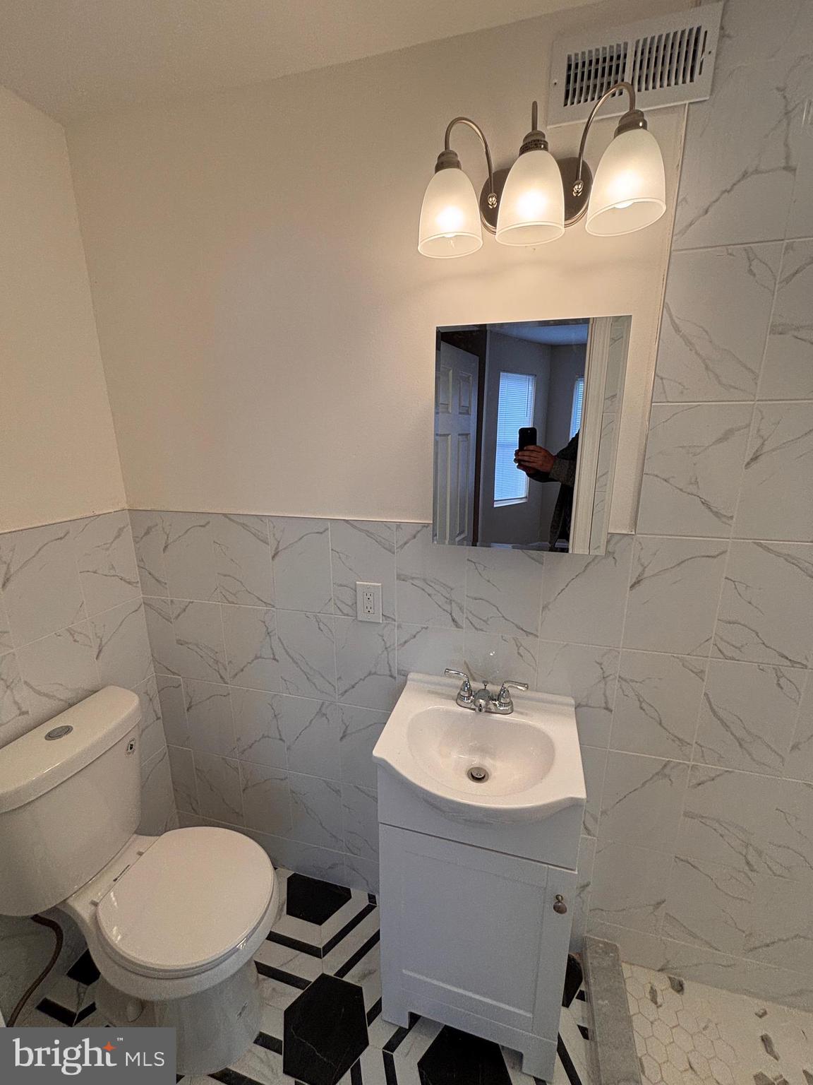 1616 North Redfield Street Philadelphia, PA 19151 - Photo 28 of 42 Master bathroom with imported tile