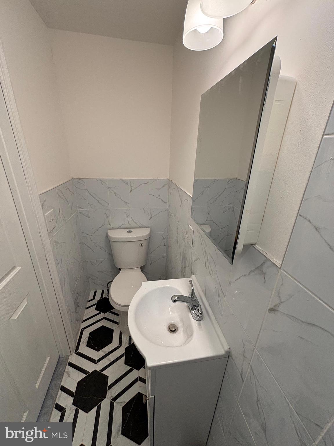 1616 North Redfield Street Philadelphia, PA 19151 - Photo 29 of 42 Master bathroom with imported tile