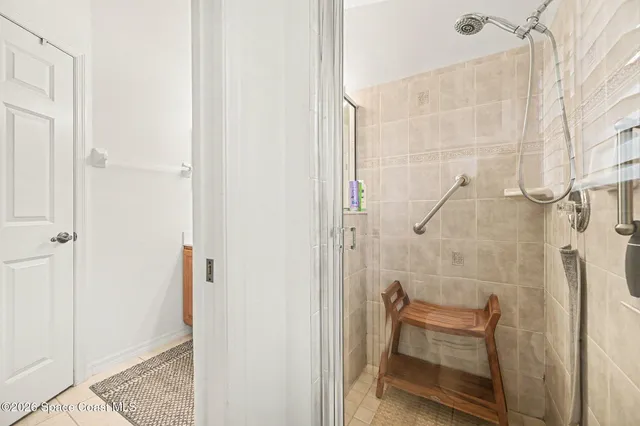 a view of a house with pool and a yard