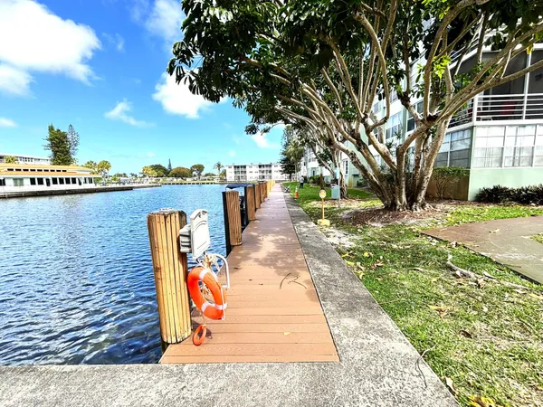 a house view with a backyard space
