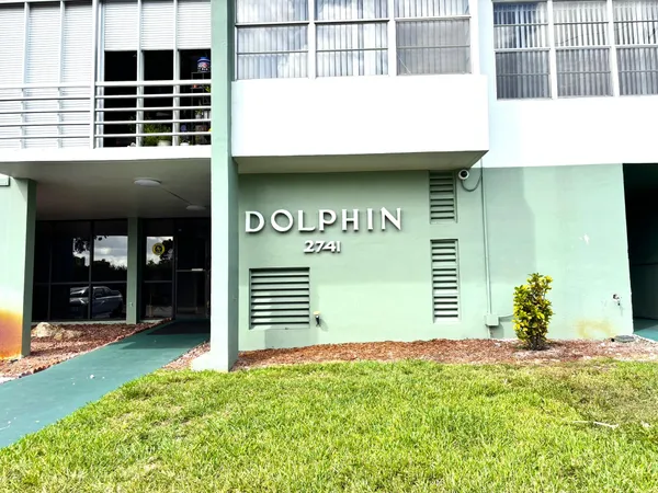 a view of a lake with outdoor seating