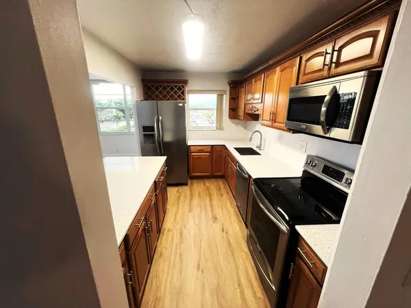 a hallway with seating area