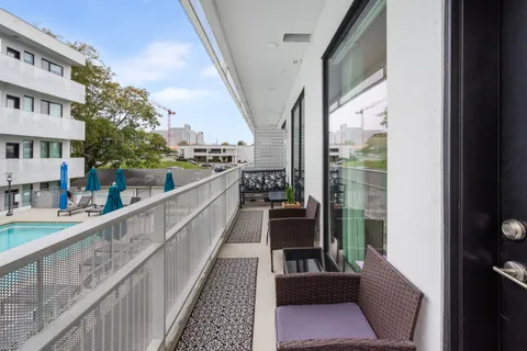 a view of a building from a balcony