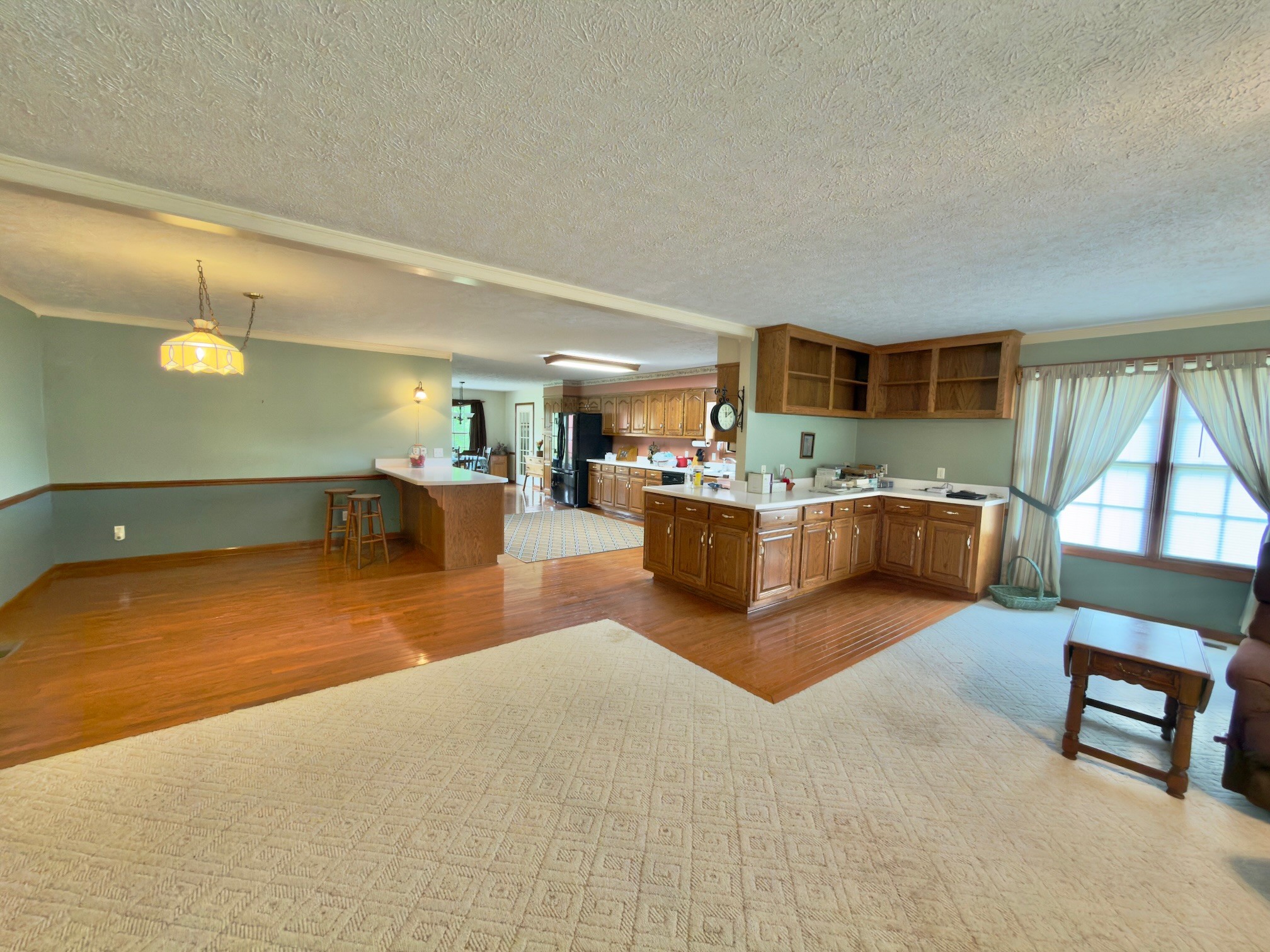 4929 Fountain Grove Road Morrison, TN 37357 - Photo 15 of 33 a living room with furniture a pool table and a large window