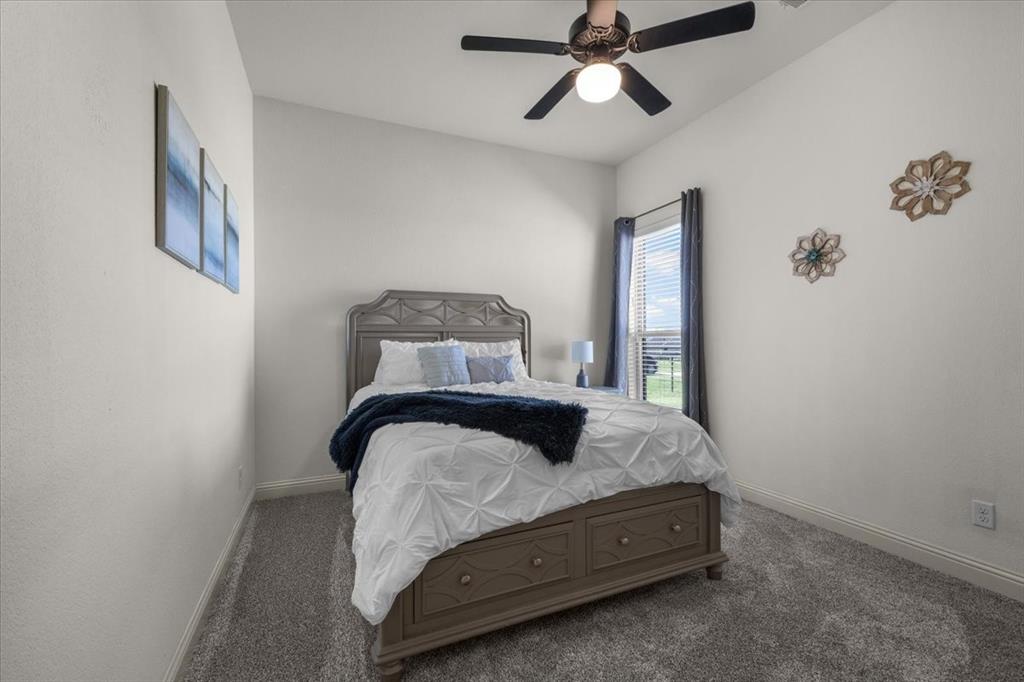 329 Palo Alto Drive Springtown, TX 76082 - Photo 26 of 34 Bedroom featuring new carpet and ceiling fan