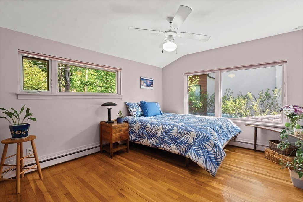 26 Valley Spring Road Newton, MA 02458 - Photo 15 of 24 a bedroom with a bed and a large window