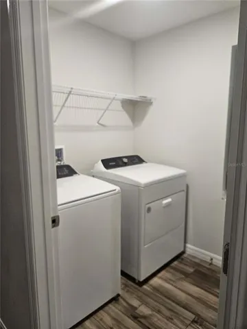 a utility room with dryer and washer
