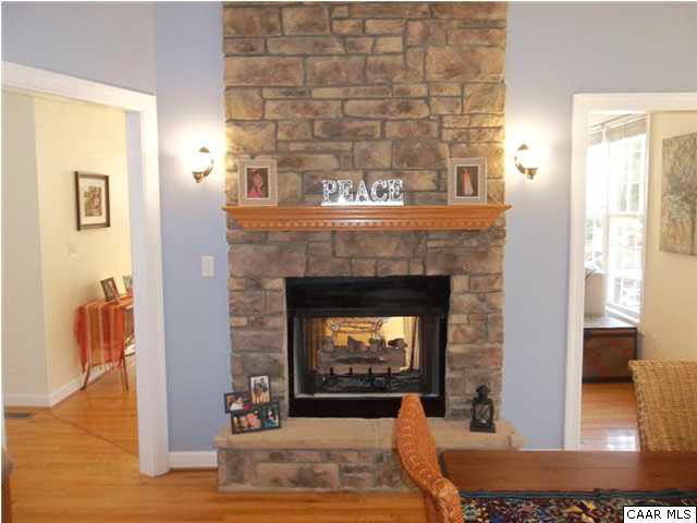 16 Vine Ridge Drive Palmyra, VA 22963 - Photo 8 of 30 a living room with a fireplace in it