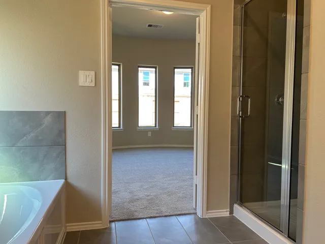 a view of a swimming pool with a yard