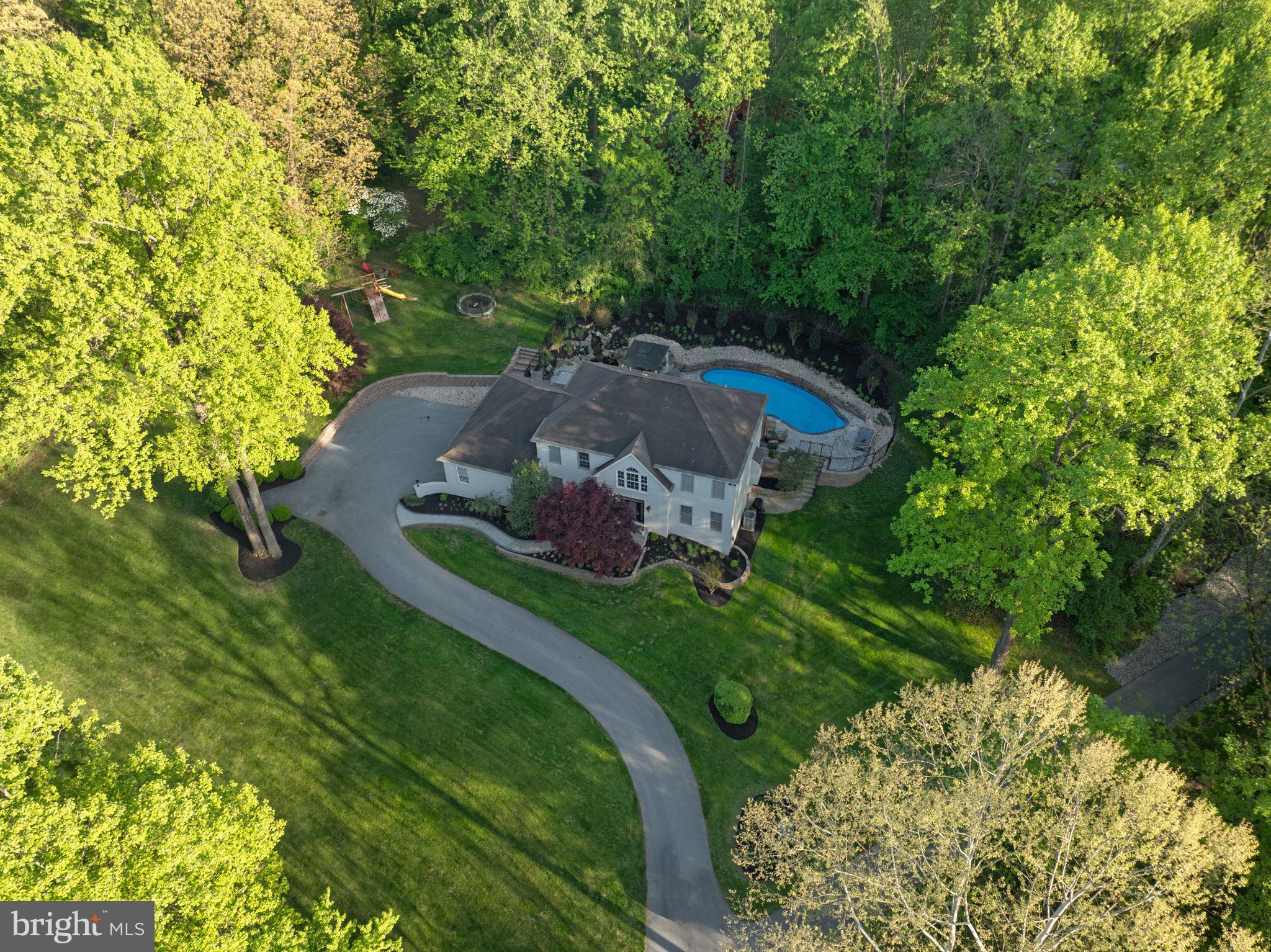 1350 Skelp Level Road Downingtown, PA 19335 - Photo 1 of 50 a backyard of a house with a yard and outdoor seating