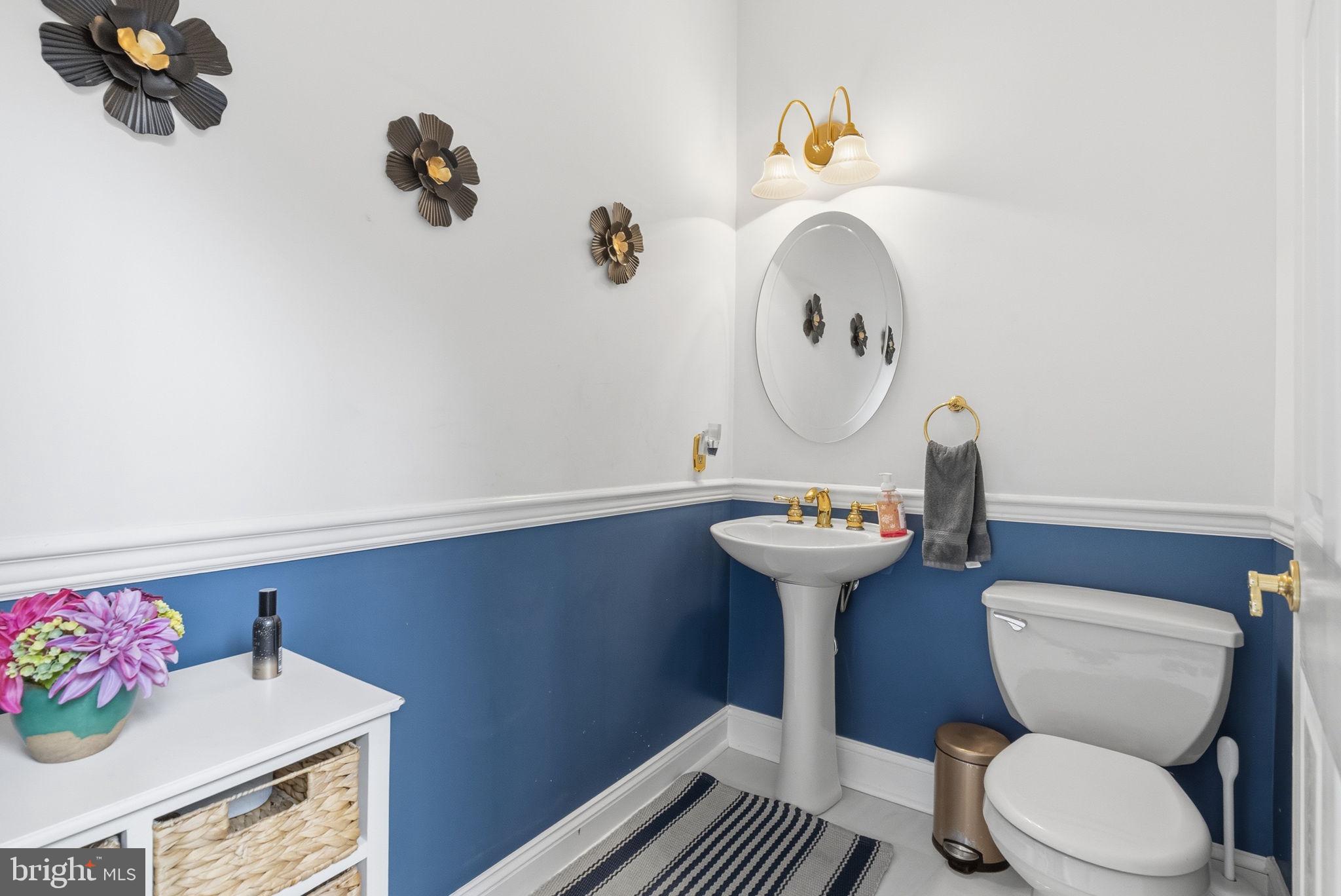 1350 Skelp Level Road Downingtown, PA 19335 - Photo 20 of 50 a bathroom with a sink mirror vanity and toilet