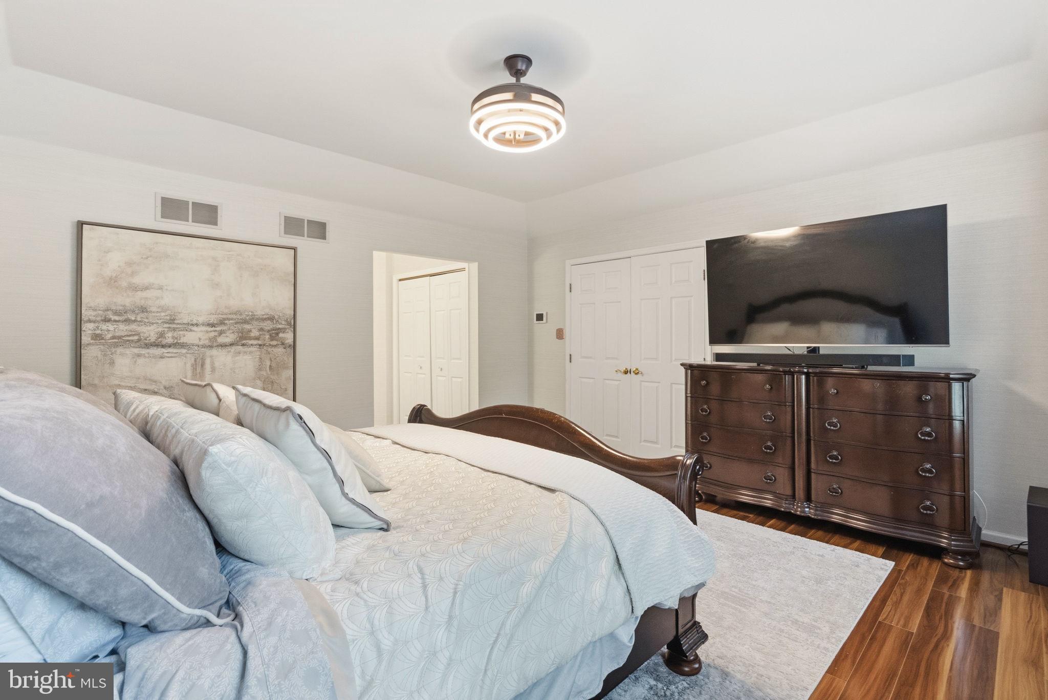 1350 Skelp Level Road Downingtown, PA 19335 - Photo 24 of 50 a bedroom with a bed and a flat screen tv